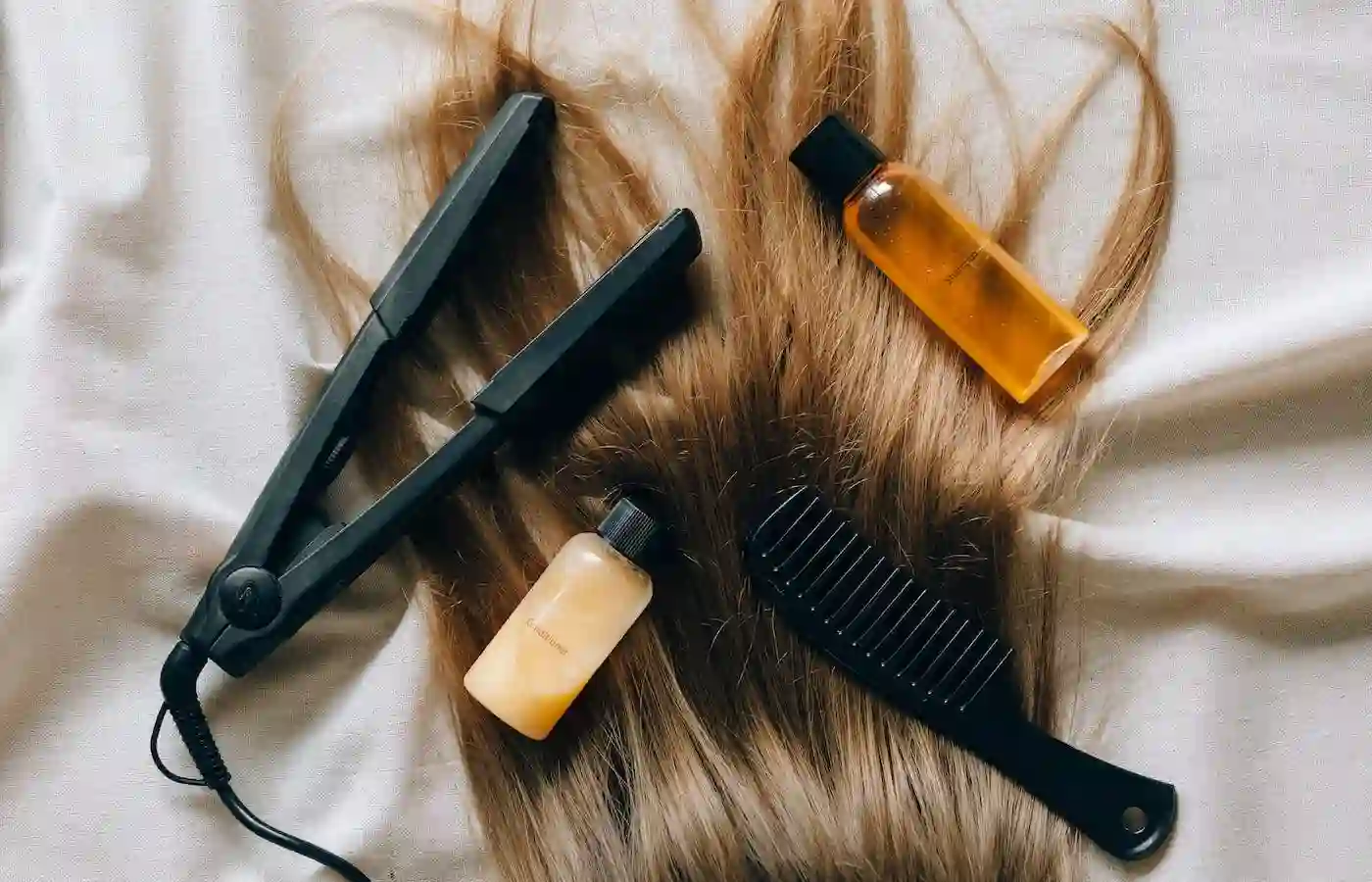 Flat iron, hair comb and hair products. - Best Hair Tools