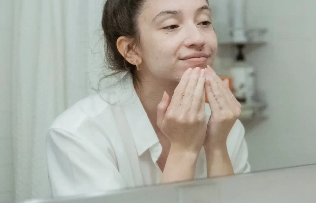 Woman cleansing her face - Best Makeup Removers